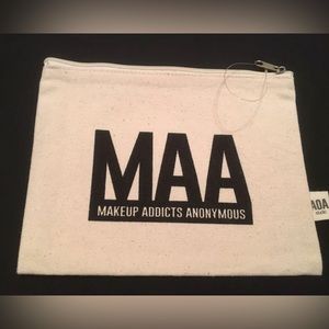 Canvas cosmetic/storage bag, new with tags.